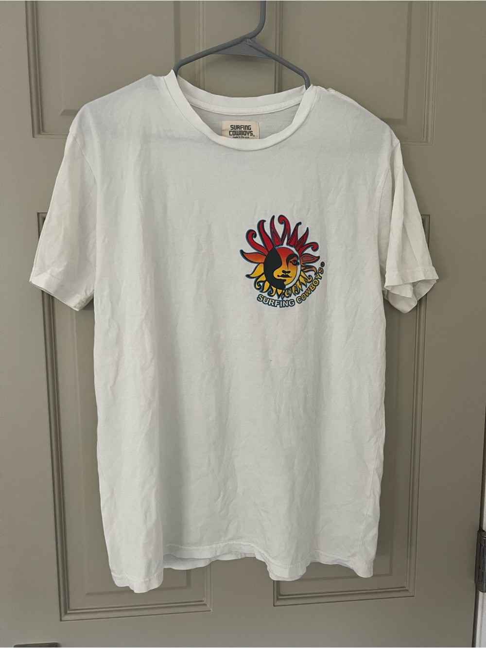 Surfing Cowboy White Graphic Tee with Sun Logo